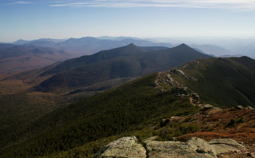 Aerial of Franconia Notch showing mountains, rocks, and low greenery